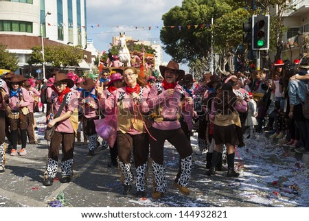 LIMASSOL,CYPRUS - MARCH 10:Grand Carnival Parade -an unidentified people of all ages ,gender and nationality in colorful costumes during the street carnival on March 10, 2013 in Limassol, Cyprus.