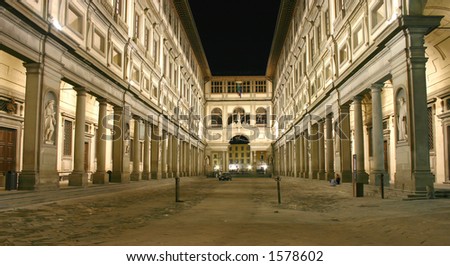 The Uffizi museum in Florence, Italy, by night.  Faces blurred by long exposure.