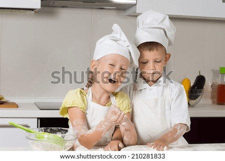 Missy Little Chefs Baking Something to Eat in Kitchen