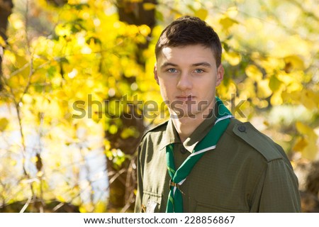Close up Handsome White Male Scout in Uniform Looking at Camera.