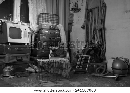 Messy Assorted Junked Old Items in a Room. Captured in Monochrome.