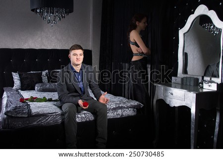 young White Sweethearts in Formal Evening Fashion Having Misunderstanding While at the Bedroom