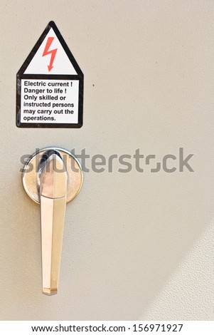 Aluminum door knob on the door of electric control box