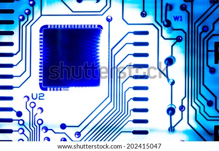 part of electronic circuit on light blue