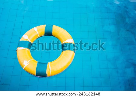 Life preserver floating in a  swimming pool
