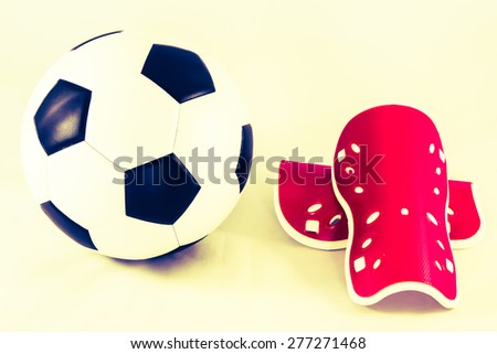 soccer ball and shin guard  vintage style