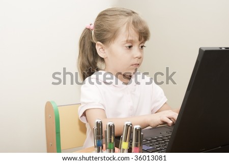 Portrait of beautiful caucasian girl learning with computer
