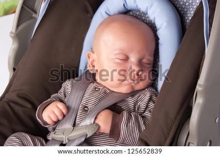 Adorable Little Girl Eating Yogurt  Baby Boy Sleeping In Safety Seat