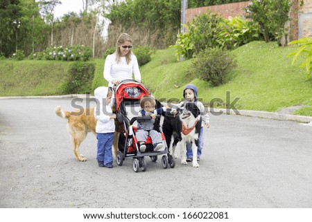 Lovely Mother with Her Children, Mums with strollers in the park