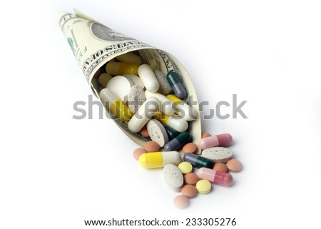 small heap of paper dollars fine and medicines