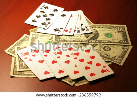 playing cards in hand of the player in poker
