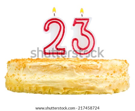 birthday cake with candles number twenty three isolated on white background