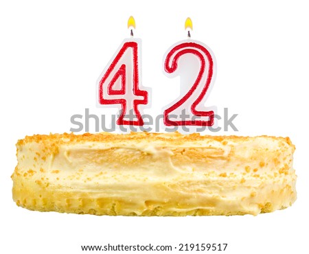 birthday cake with candles number forty two isolated on white background