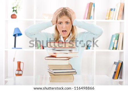 Student in panic because there is not enough time to learn for exam,Young student in panic