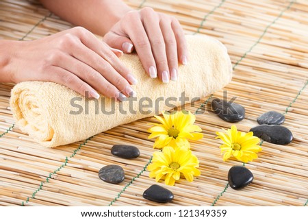 Beautiful woman\'s hands on towel,Female hands