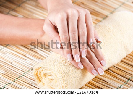 Beautiful woman\'s hands on towel,Female hands