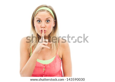 Portrait of cute blue-eyed girl with finger on her lips,It\'s a secret!