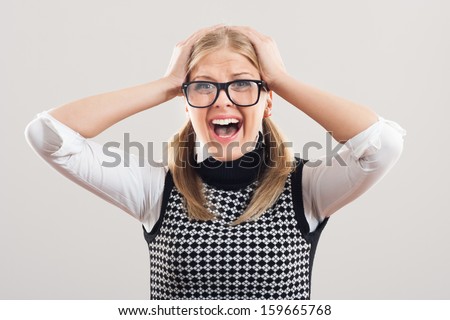 Nerdy woman is very frustrated because of something,Frustrated nerdy woman