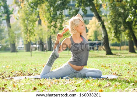 Young woman doing yoga in the park,Yoga