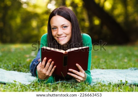 Young beautiful woman is reading a book and enjoy in her free time,Leisure time