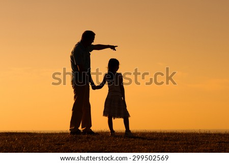 Father and daughter enjoy spending time together outdoor.Precious family moments