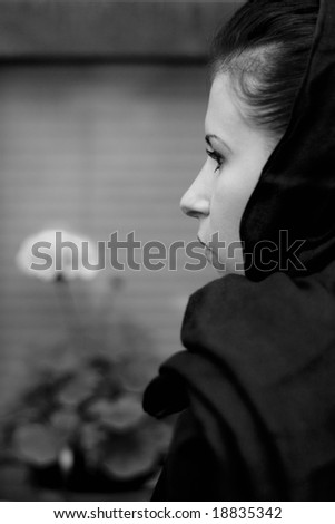 monochrome closeup portrait of inconsolable widow