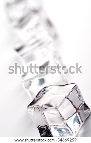 stack of ice cubes on white background