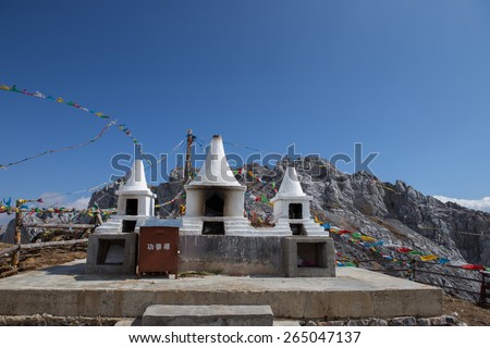 Stupa for burning prayer paper at highest mountain Blue moon valley mountain  Shangri-la China