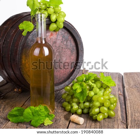White wine with old wine barrel on white background