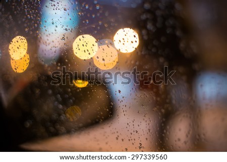Abstract image of bokeh lights in the city, rain