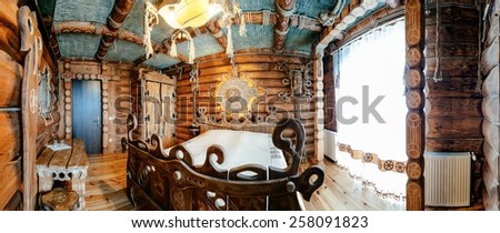 Unique ethnic interior. Traditional (national) design. The hotel room. Ukrainian style and specific decorations of Kievan Rus historical period. Europe, Ukraine, Carpathians, Hotel \