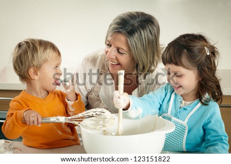 Family cooking with grandmother