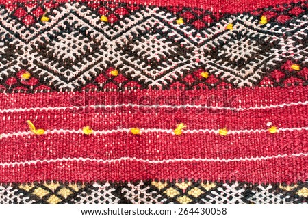 Red kilim textile material as a background image