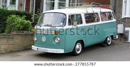BURY ST EDMUNDS, ENGLAND - 11TH MAY 2015: Vintage VW Camper Van parked outside a house.