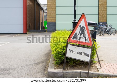\'Tree cutting\' safety warning sign  closeup