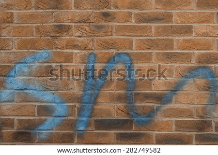 Soul mate \'SM\' metaphor Graffiti on the wall closeup