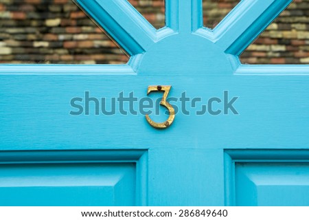 Door number 3 three conceptual image closeup