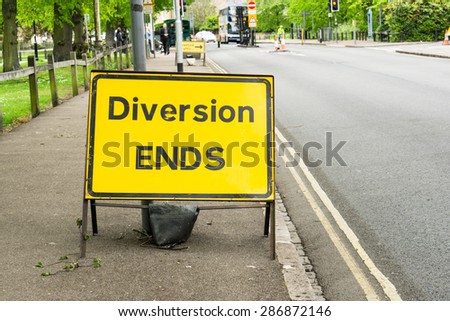 'Diversion ENDS' sign to guide traffic closeup