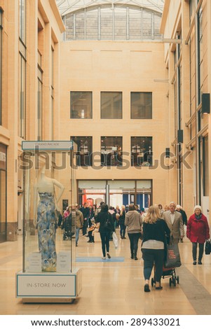 CAMBRIDGE, ENGLAND - 7 MAY 2015: Shoppers in Lion Yard, Grand Arcade Shopping mall, Cambridge, England