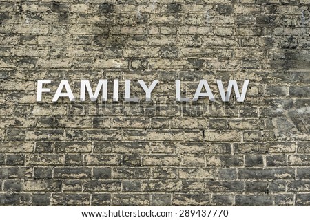 \'Family Law\' text on brick wall conceptual image