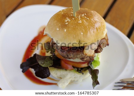 premium hamburger serve with bacon