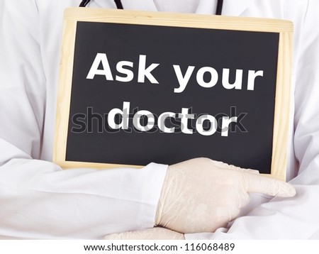 Doctor shows information on blackboard: ask your doctor