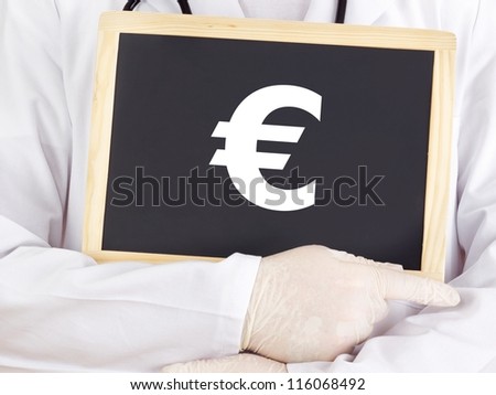 Doctor shows information on blackboard: euro