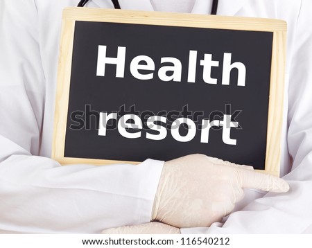 Doctor shows information on blackboard: health resort