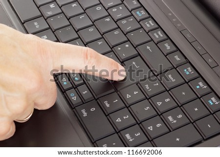 Person typing on the computer