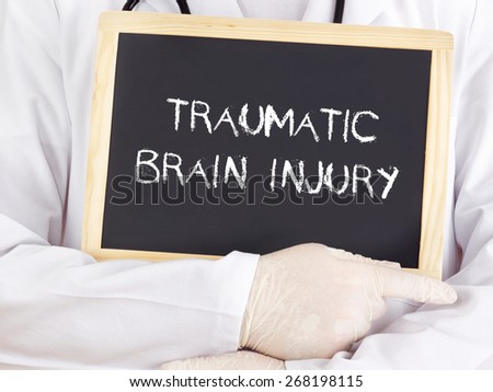Doctor shows information: traumatic brain injury
