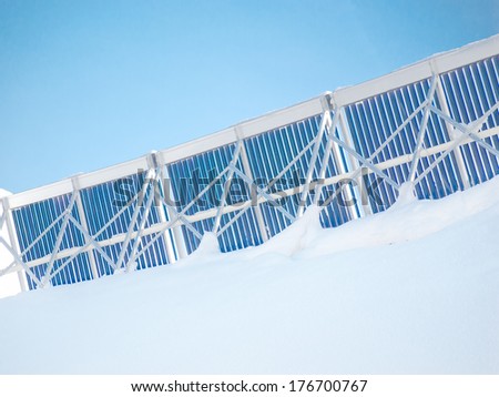 roof with thermal tubes during the winter covered with snow