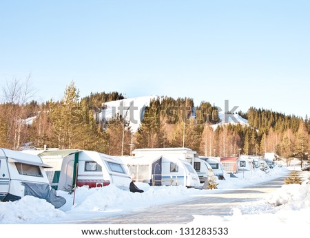 winter camping with caravan near the ski slope