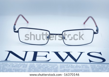 smart glasses on newspaper page