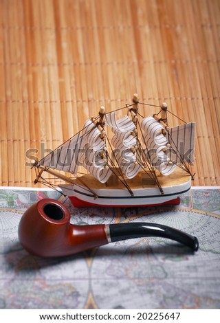 hobby model of sailboat. Antique pirate map. retro collection